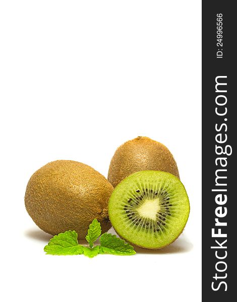 Whole and half kiwi.  on white background. Whole and half kiwi.  on white background