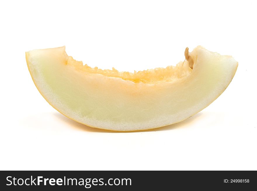 Slice of melon isolated on white background