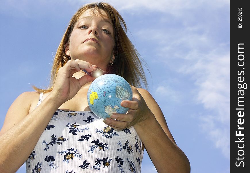 Woman shutting out the world with a remote. Woman shutting out the world with a remote