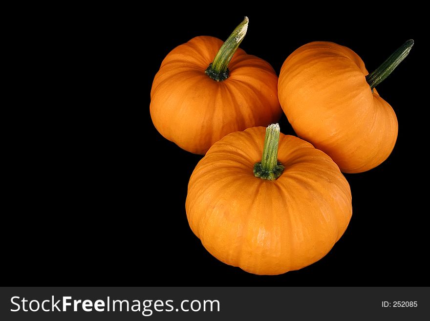 Orange squash isolated on a black background. With clipping path. Orange squash isolated on a black background. With clipping path.