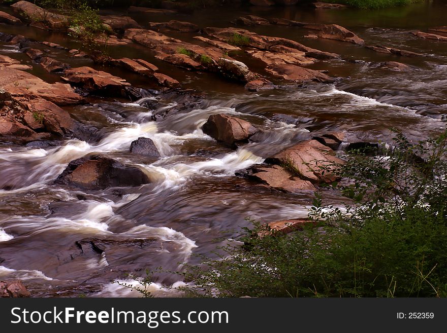 Water flowing over rocks. Water flowing over rocks