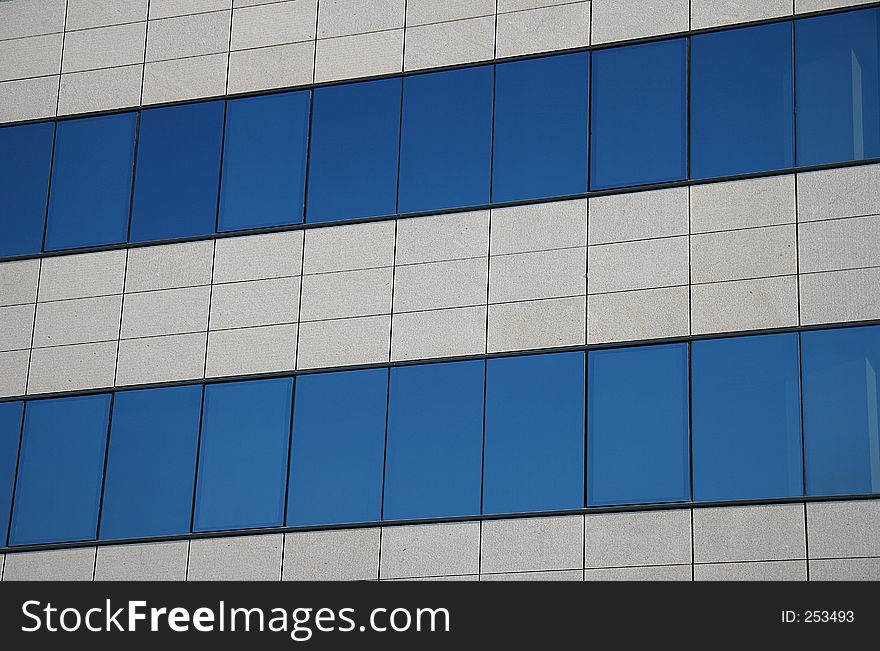 Blue glass windows on a business building