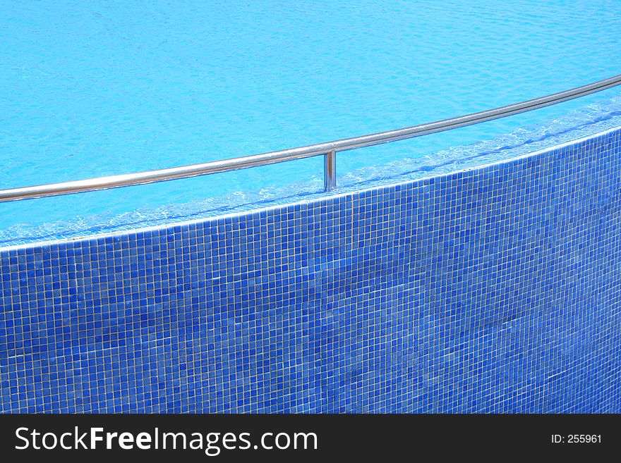 Modern blue swimming pool. Modern blue swimming pool...