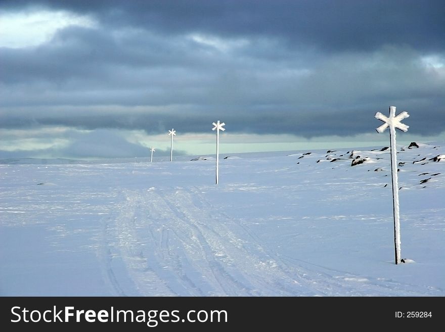 Snowy tracks, storm coming