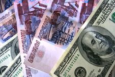US Dollars And Russian Roubles Royalty Free Stock Photo US Dollars And Russian Roubles Royalty Free Stock Photo
