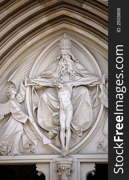 Portal in cathedral, religious motive,