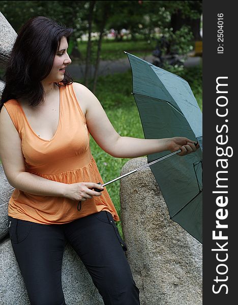 Portrait of woman holding umbrella. Portrait of woman holding umbrella