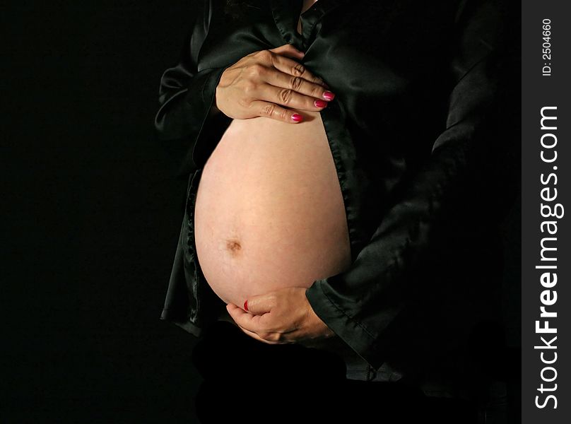 Pregnant Woman holding her Beautiful Belly