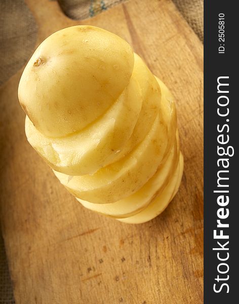 Fresh  young potatoes on wood