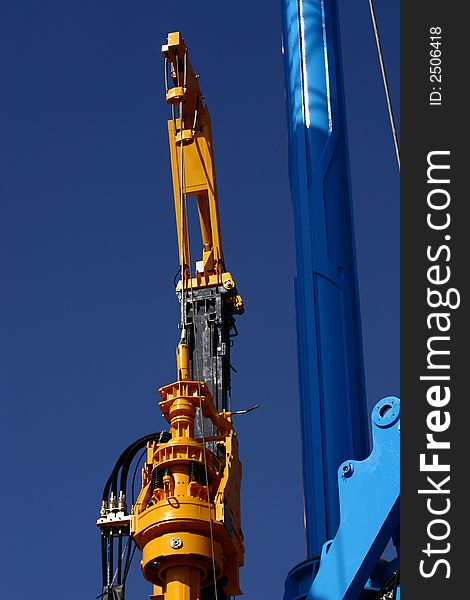 Sophisticated construction equipment on a blue sky. Sophisticated construction equipment on a blue sky