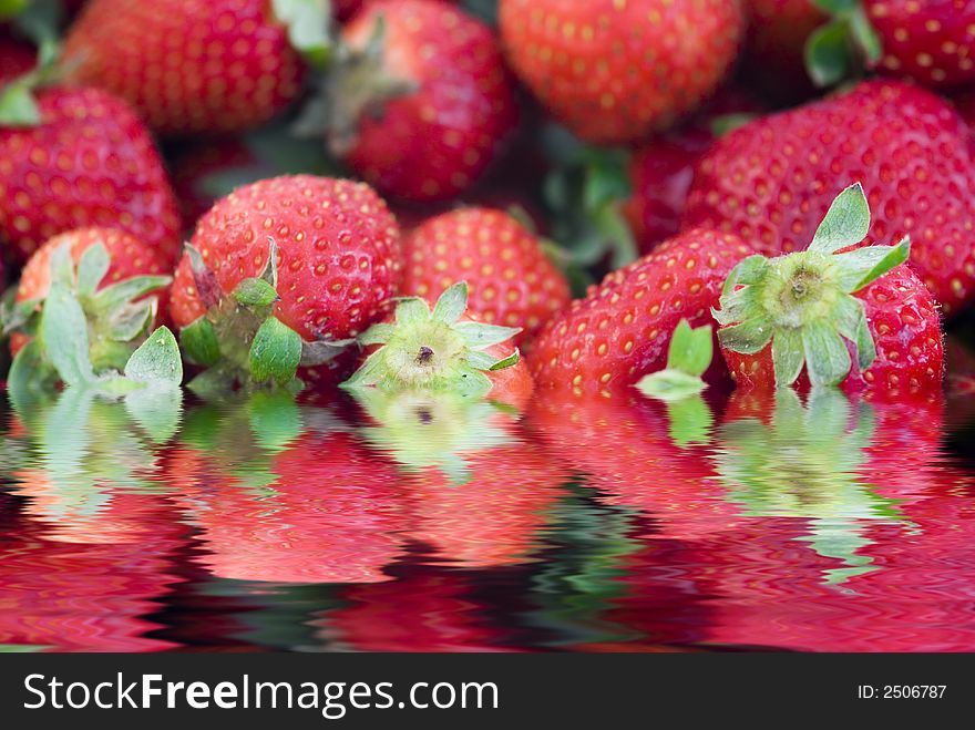Strawberrys surrounded by water, water reflection. Strawberrys surrounded by water, water reflection