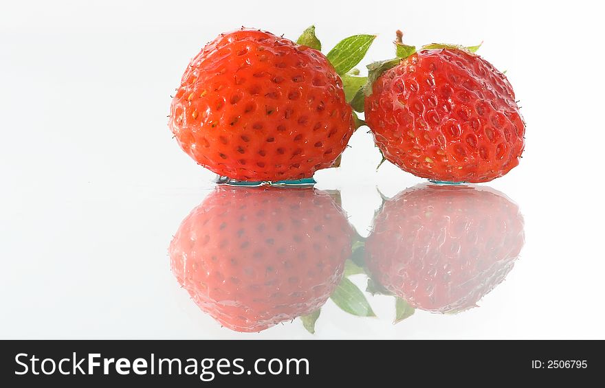 Two strawberry's isolated on white