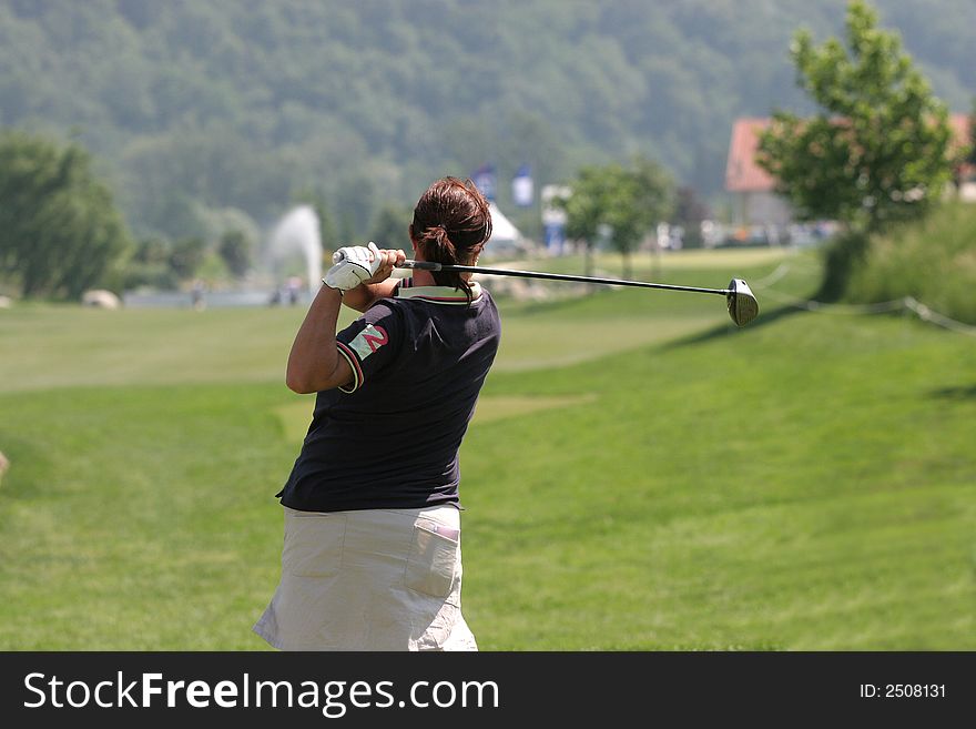Lady golf swing in losone