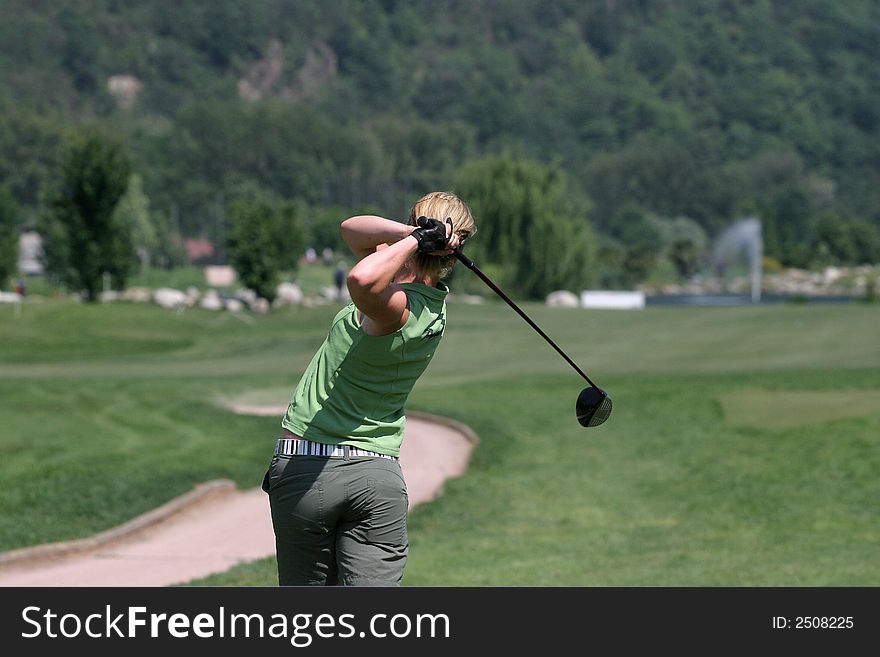 Lady golf swing in losone