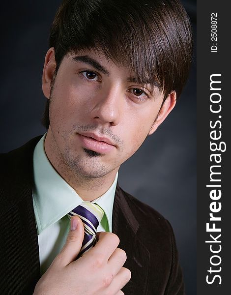 Portrait of a young business man with tie. Portrait of a young business man with tie