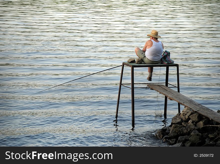 Fisher man on a river