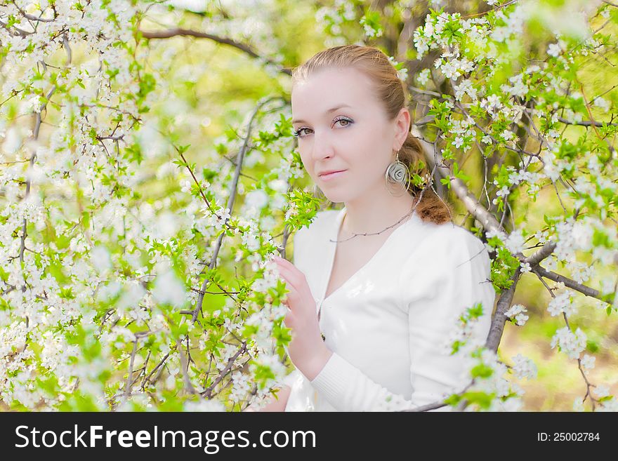 Spring blooming and girl