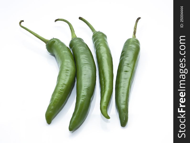 Green Chilli On The White Background