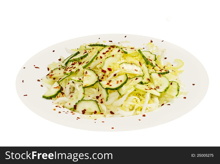 Vegetarian salad in a plate on the white, isolated