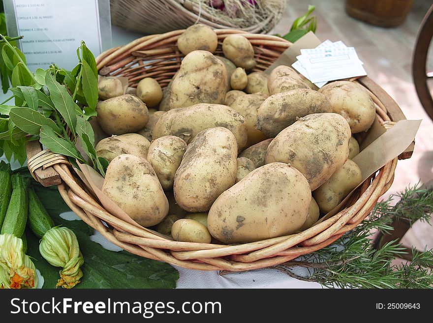 A basket of potatoes at market place