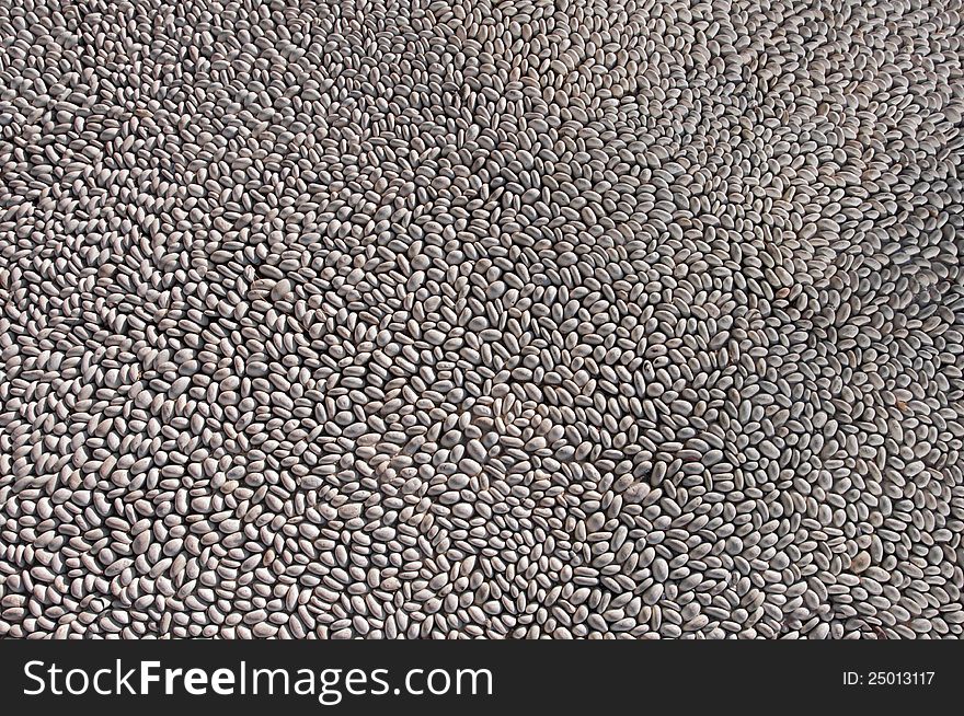 Abstract background from smooth grey sea pebble. Abstract background from smooth grey sea pebble