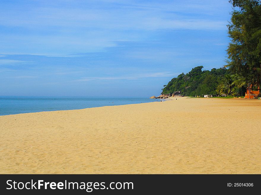 Long sandy beach at Teluk Cempedak near Kuantan, Malaysia.