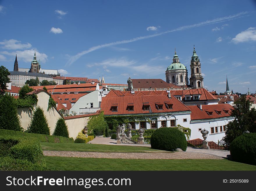 Prague castle and Nicholas church view from baroque garden - Czech Republic. Prague castle and Nicholas church view from baroque garden - Czech Republic