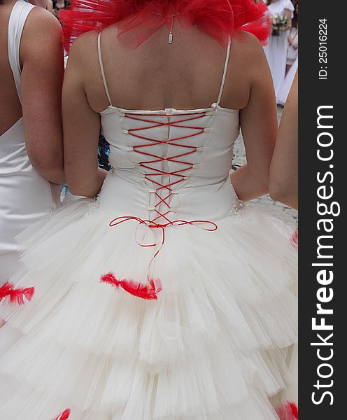 Image of red and white lace up corset