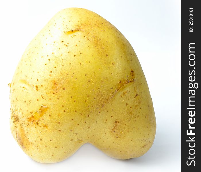 Potato isolated upside down heart-shaped with a white background