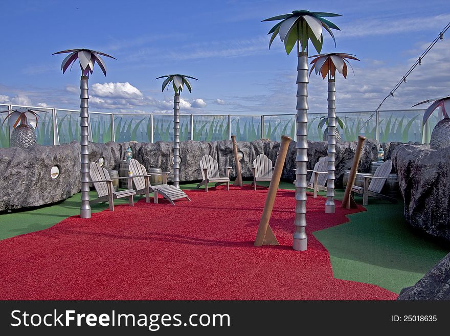 Children's play area with palm tree lights and small chairs to have fun in. Children's play area with palm tree lights and small chairs to have fun in.