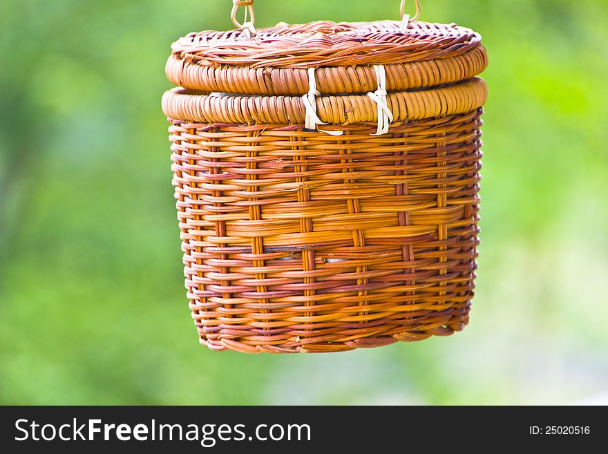It is a basket ,and is weaved with wild rattan by hand by zhuang people in guangxi province ,china. It is a basket ,and is weaved with wild rattan by hand by zhuang people in guangxi province ,china