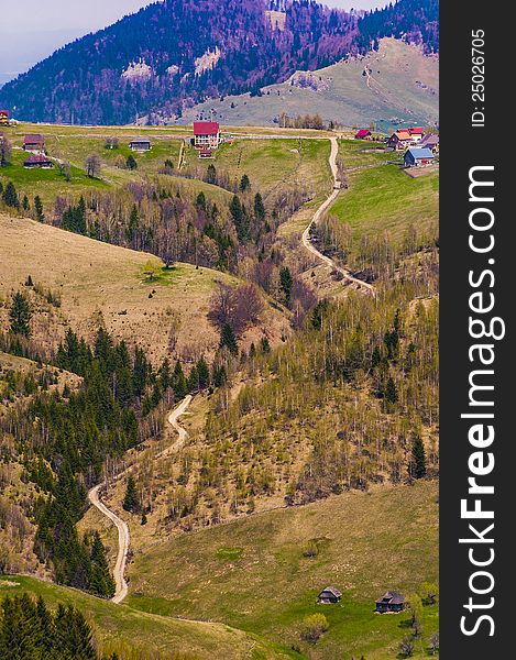 Landscape with a rural dirt road in the mountains