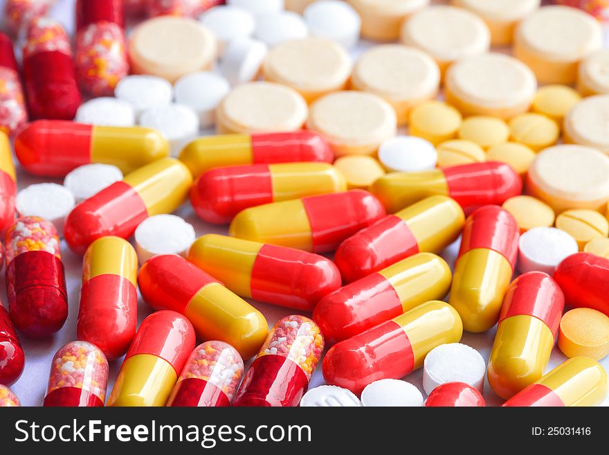Closeup Colorful tablets with capsules