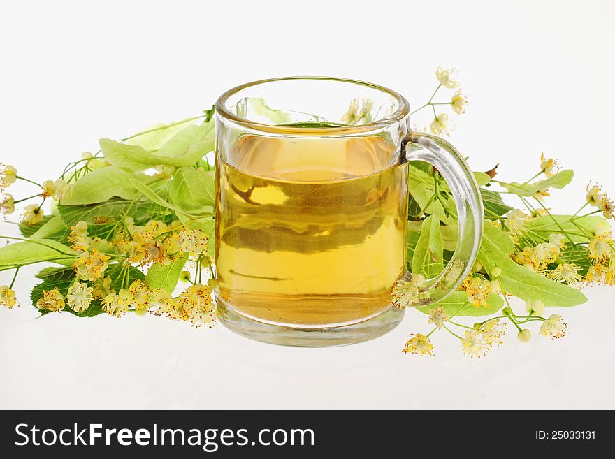 Cup of tea with fresh linden-tree flowers. Cup of tea with fresh linden-tree flowers