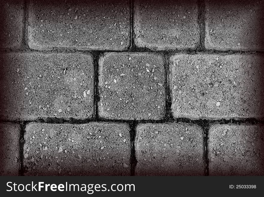 Black and white image of old brick wall with vignetting effect. Black and white image of old brick wall with vignetting effect