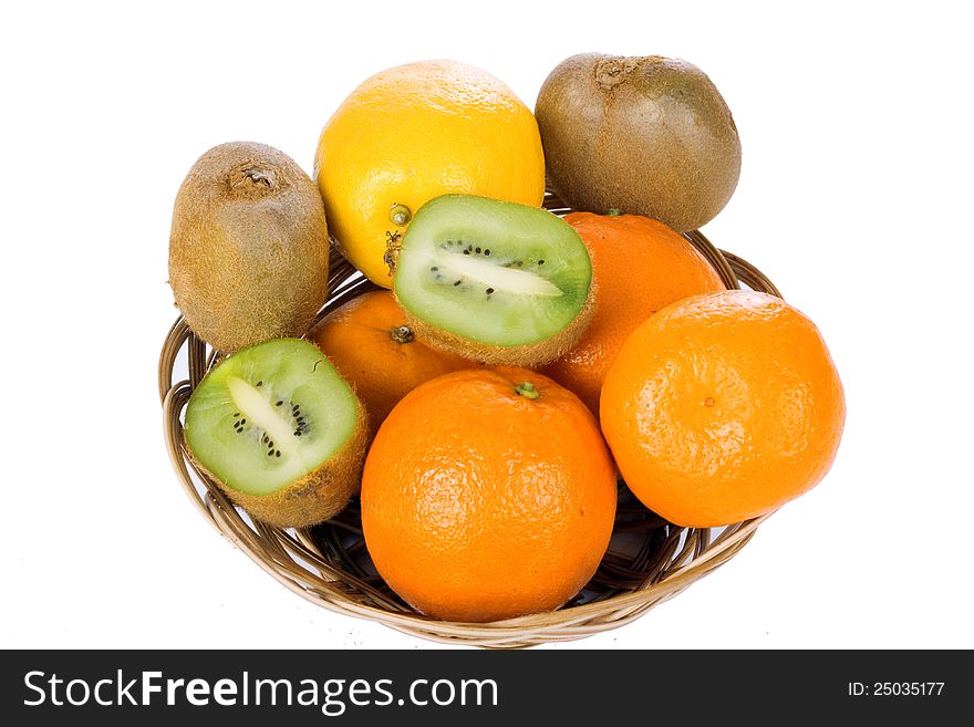 Kiwi, oranges, lemons and tangerines isolated on white background. Kiwi, oranges, lemons and tangerines isolated on white background