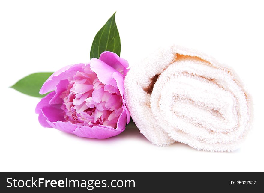 Spa towel with peony flower on a white background. Spa towel with peony flower on a white background