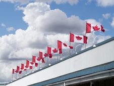 Canada Flags On Top Of A Building Royalty Free Stock Photography Canada Flags On Top Of A Building Royalty Free Stock Photography