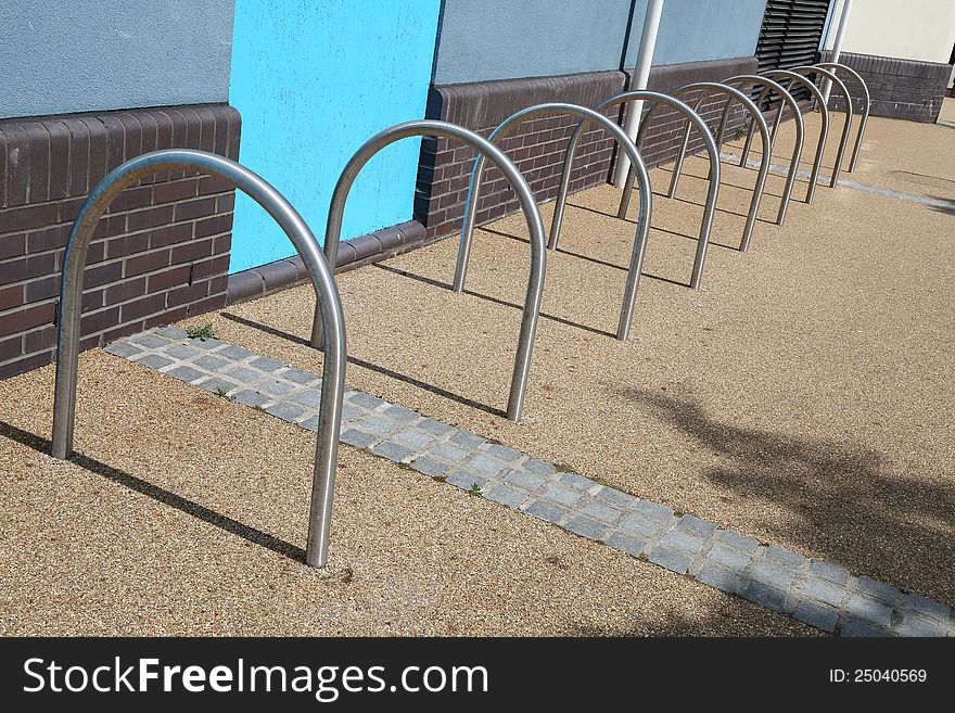 9 metal hoops in place to hold bicycles. 9 metal hoops in place to hold bicycles