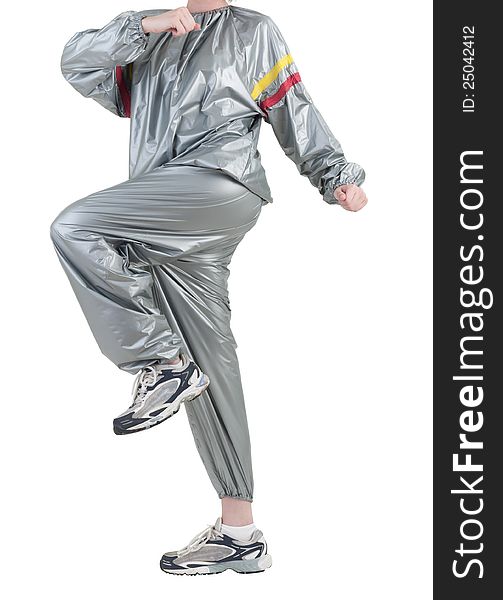 A woman is exercising with sauna suit. A woman is exercising with sauna suit