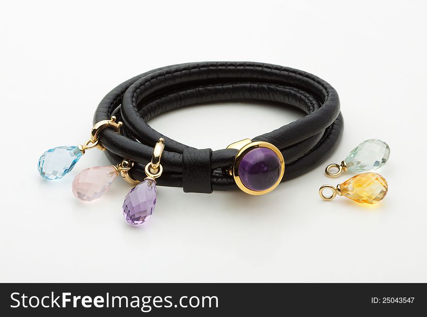 Leather bracelet decorated by beautiful gemstones