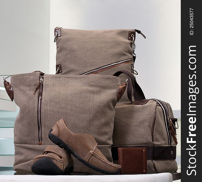 A beautiful set of canvas bags and leather man shoes
