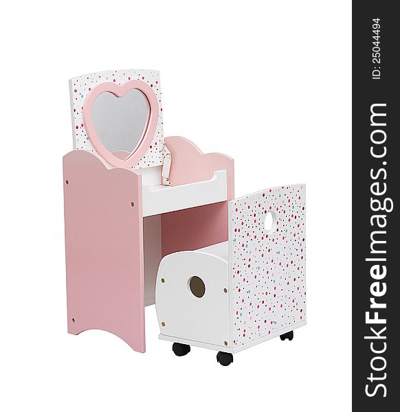 A small dressing table with chair for a girl