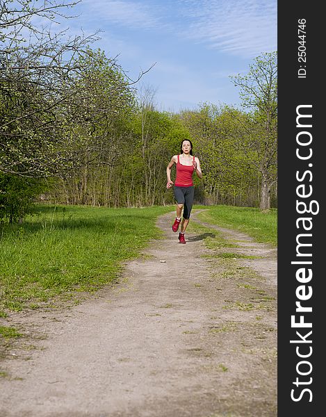 Jogging young fit woman, outside sport shot. Jogging young fit woman, outside sport shot