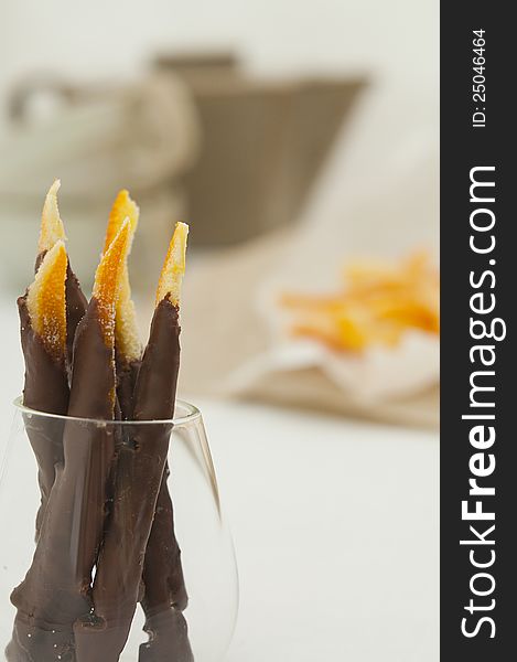 Candied orange peel in chocolate for a tea time. Candied orange peel in chocolate for a tea time