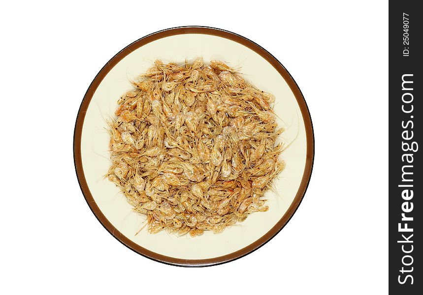 Dried shrimp in plate isolated on white with clipping path