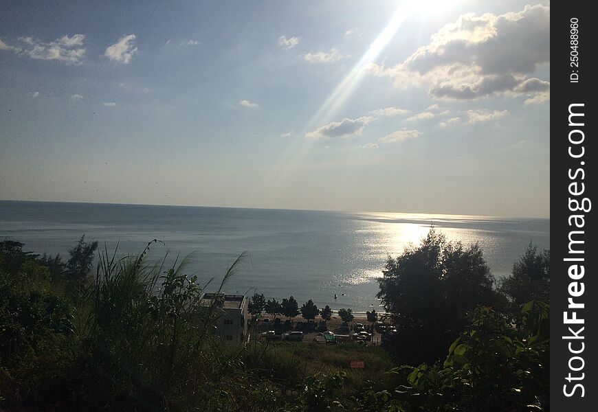 Sunset on the seashore of the Gulf of Thailand. Peaceful atmosphere. looking down from the top of the mountain