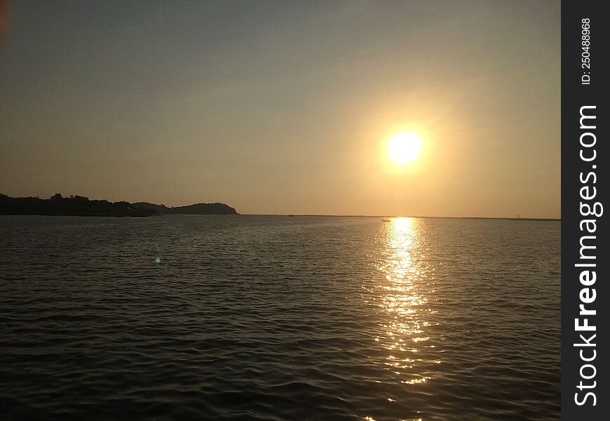 Sunset on the seashore of the Gulf of Thailand. Peaceful atmosphere.