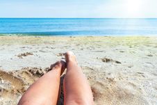 Wet Female Feet On The Beach And Sand Stock Images