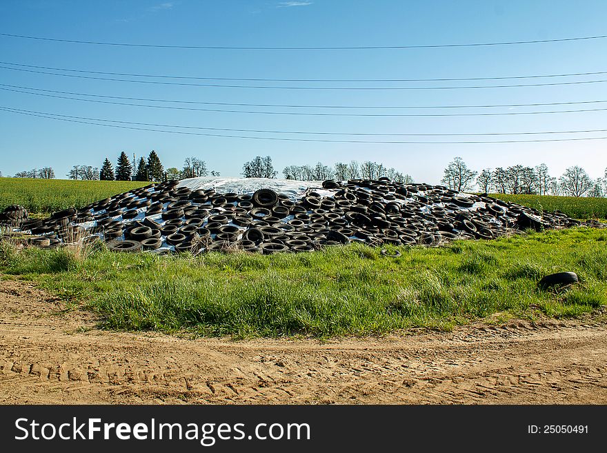 Silage By Farmers Using Old Tires As A Burden